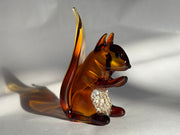 glass squirrel with cremation ash